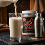 Power Mass weight gainer powder mixed into a shake, pour shot