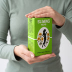 Sliming Herb Tea box held in hand, size reference