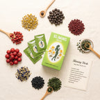 Sliming Herb Tea natural ingredients flat lay - camellia seed, hawthorn, chamomile, red bean